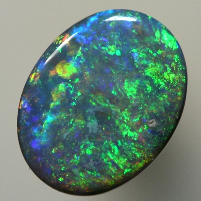 SOLID BLACK OPAL Sparkling bright oranges over greens SEE VIDEO